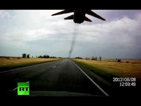 Video: Russian Su-24 fighter jet buzzes highway drivers